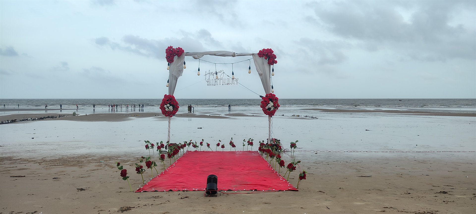 Daylight Oceanfront Red Carpet Floral Arch Mandarmani